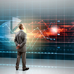 Businessman with arms crossed behind back